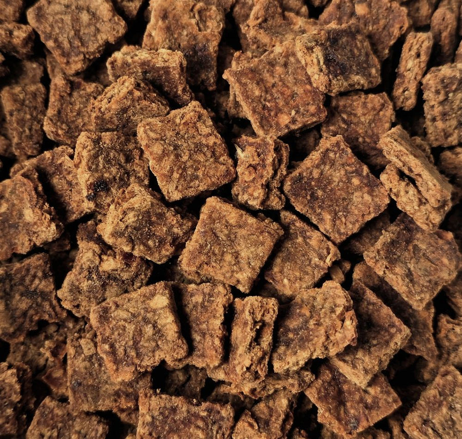 Close up of Nikyu air dried meaty squares, showing the meat fibre